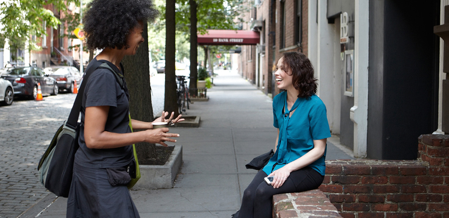 Acting teacher and acting student talking outside of HB Studio